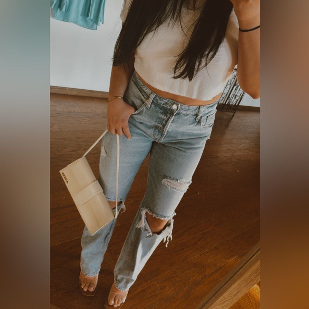 Distressed blue jeans